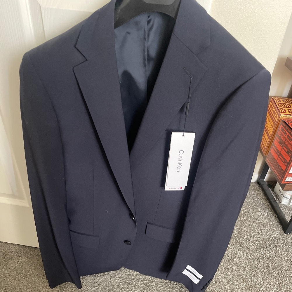 Brand new Calvin Kline navy suit jacket